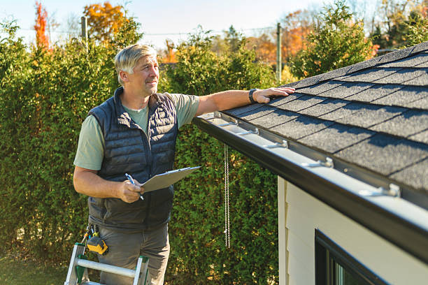 Professional Hail Damage Roof Repair technician working in Ashburnham, MA